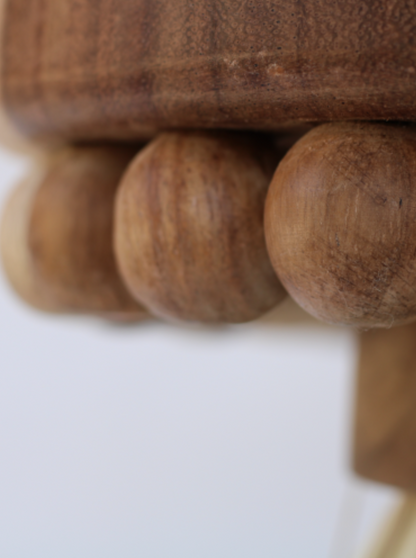 Close up of the Handcrafted TEOKALI stool made from parotta wood and palm leaves. Originating from Morelia, Michoacán, México